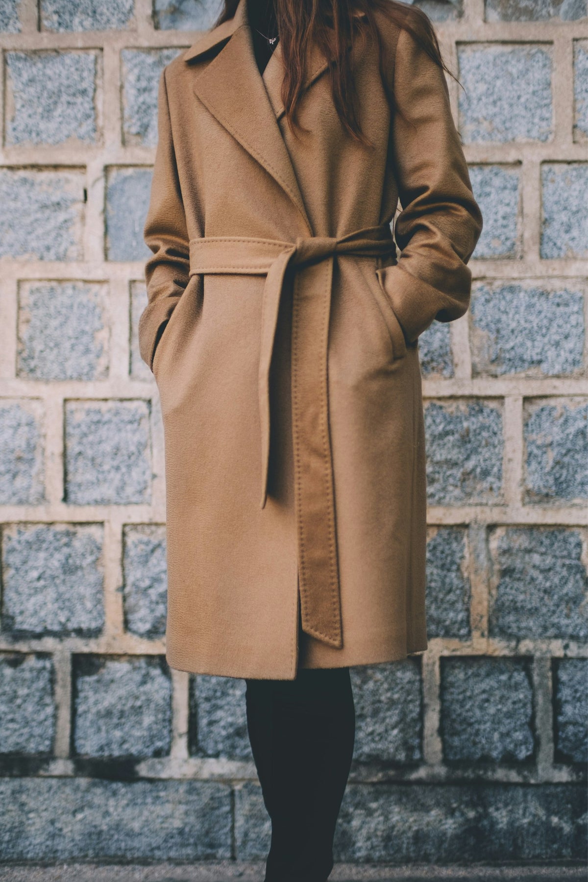 Woman in a brown coat