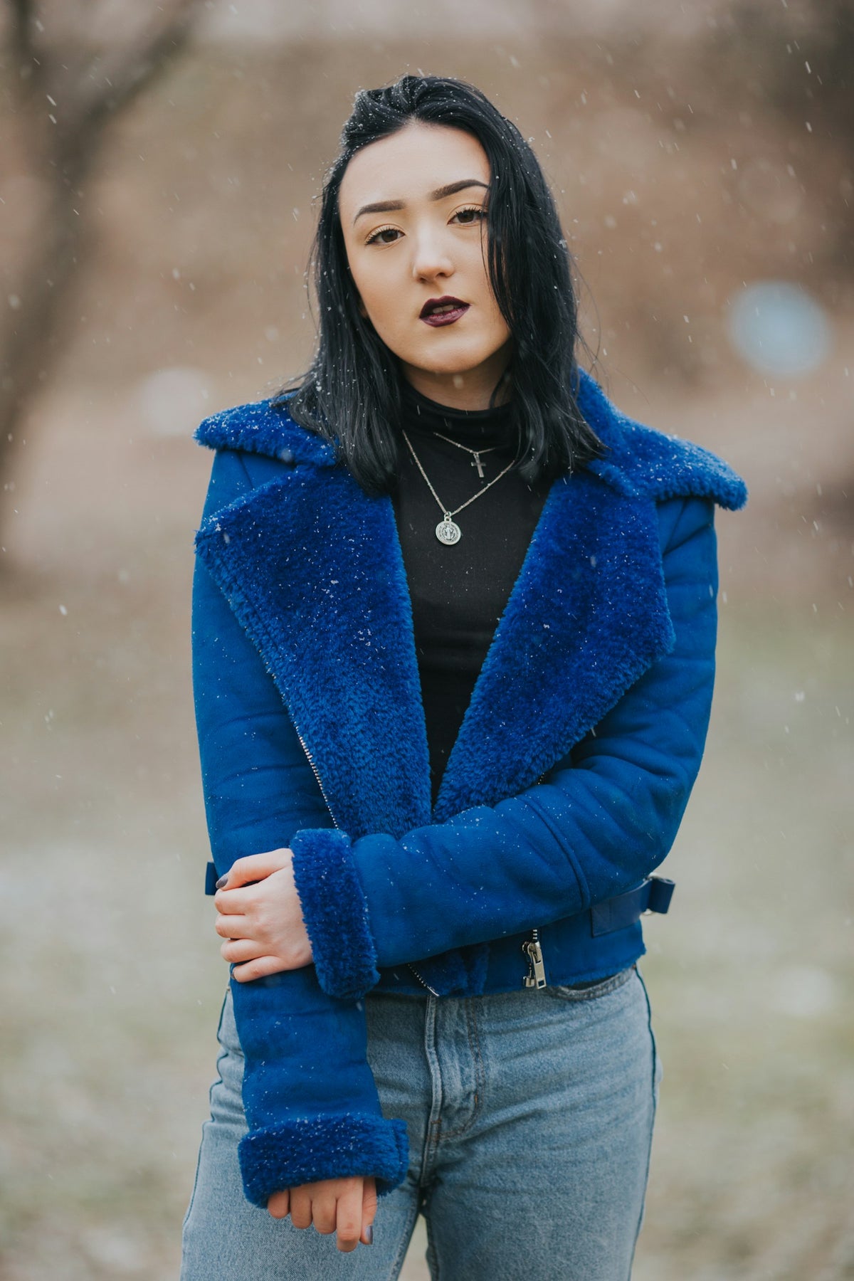 Woman wearing a blue winter coat
