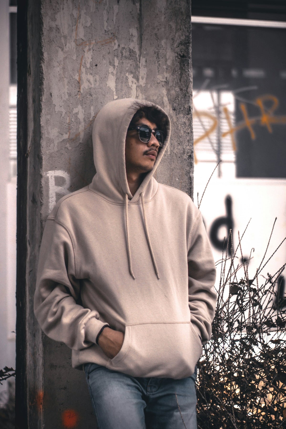 Man in a grey hoodie jacket