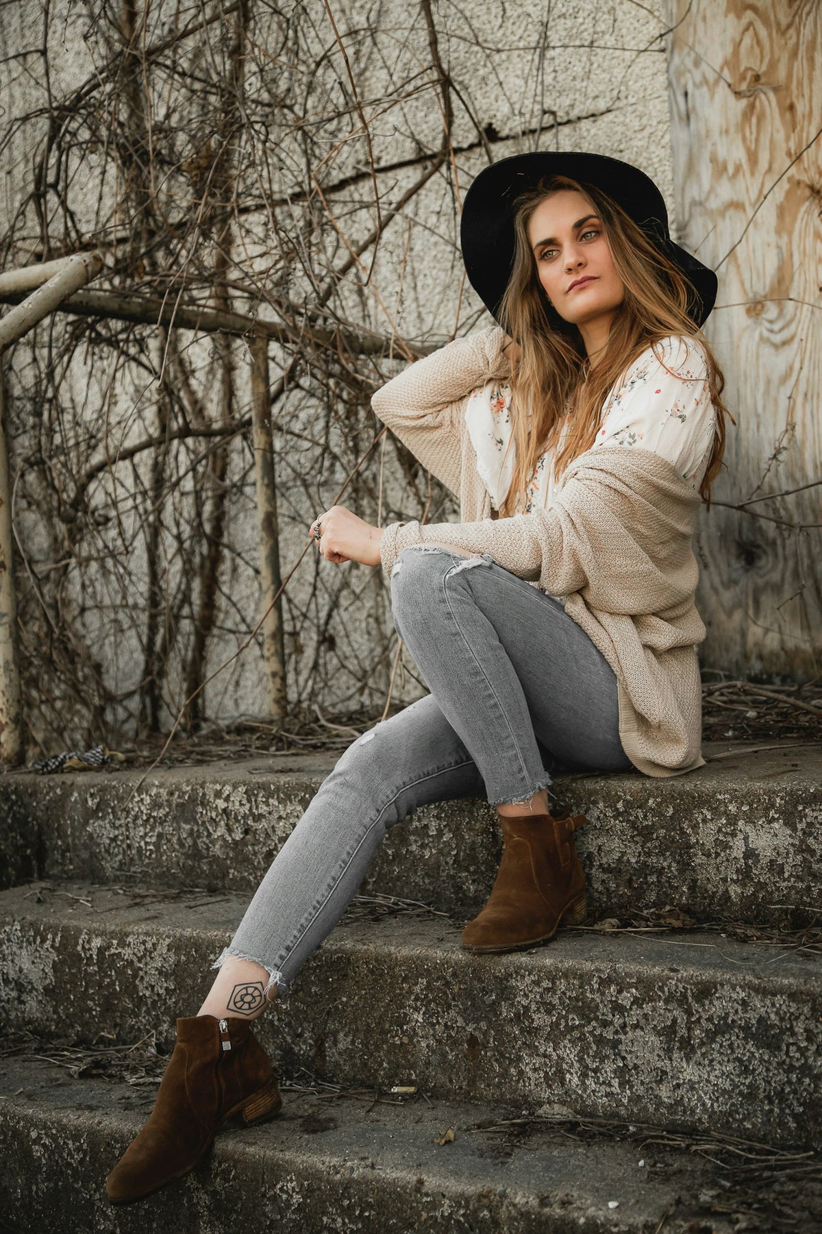Woman in a white knit layer and jeans