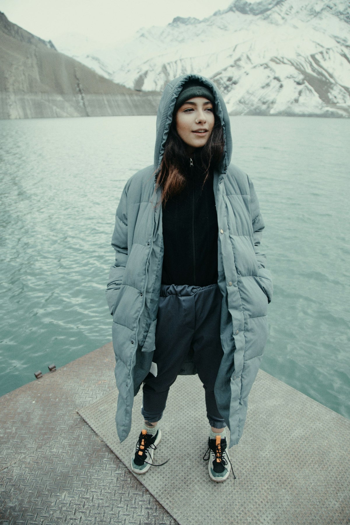Person standing in the snow in winter clothing