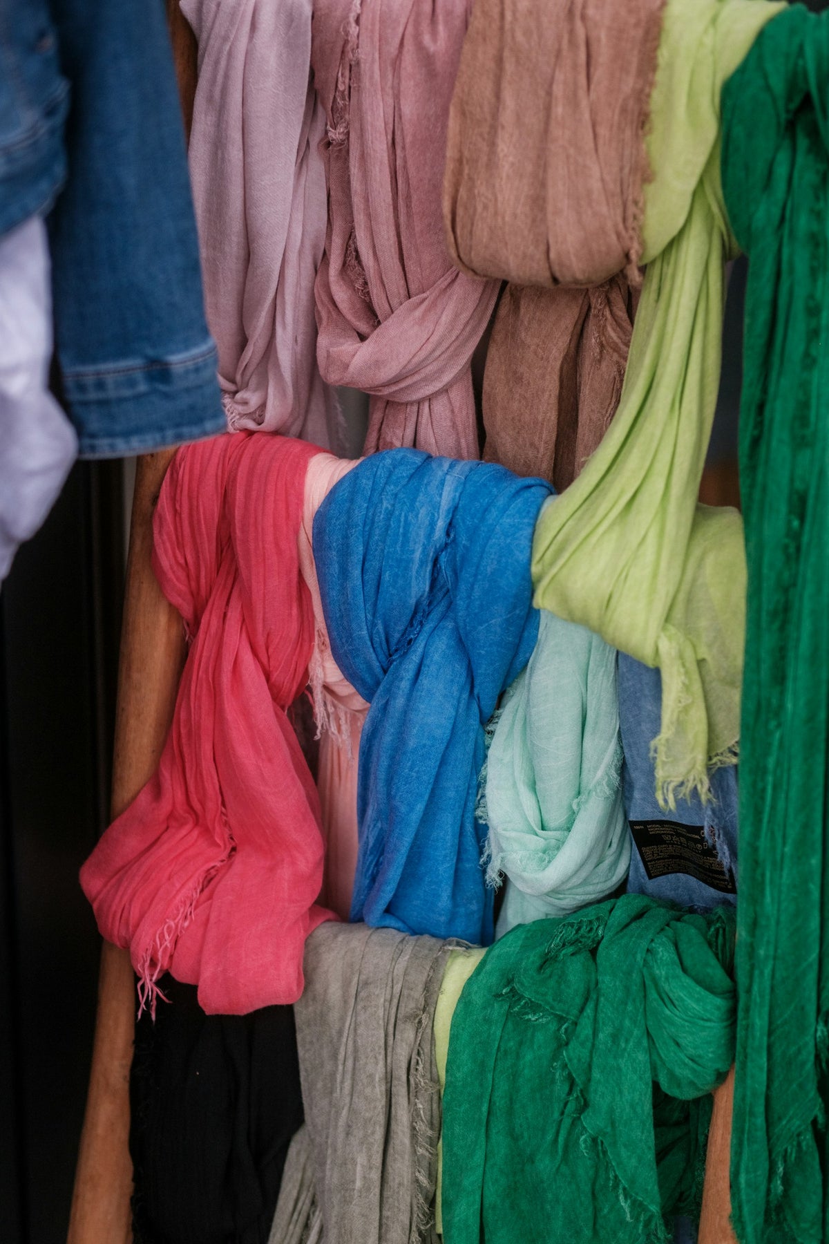Scarves hanging on a rack
